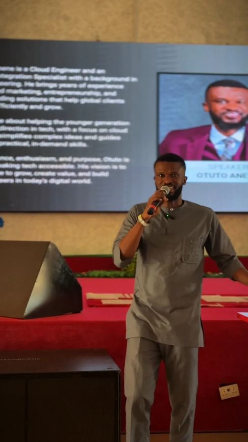 Otuto James Anene speaking on stage during the Tech Summit and Skill Acquisition in Cloud Computing seminar
