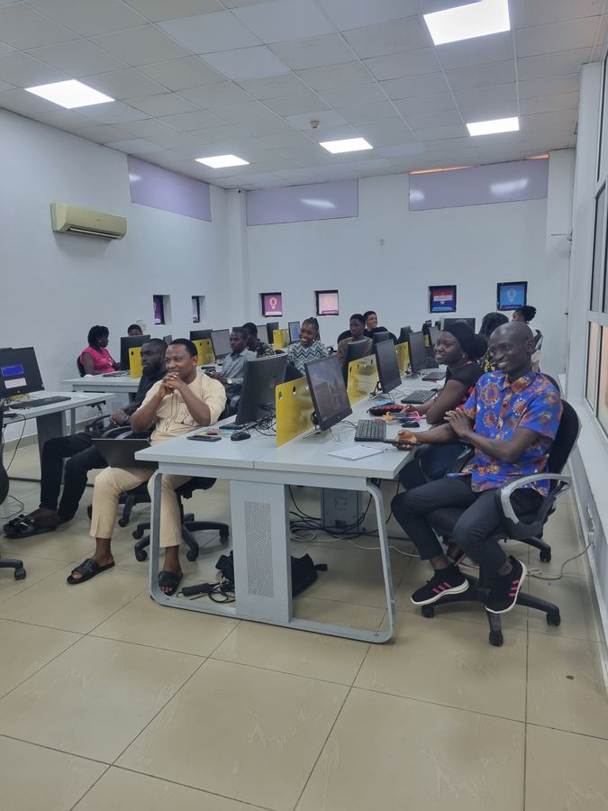 CloudTech Tribe trainees and facilitators in a computer lab training session