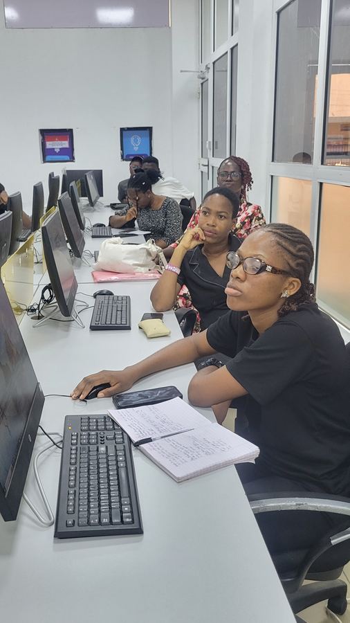 Trainees at CloudTech Tribe following along on their workstations during a session
